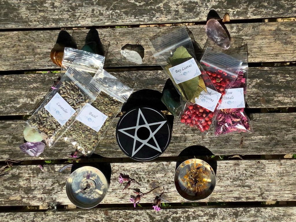 An image of some good luck spell ingrediencies including bay leaves and lavender.