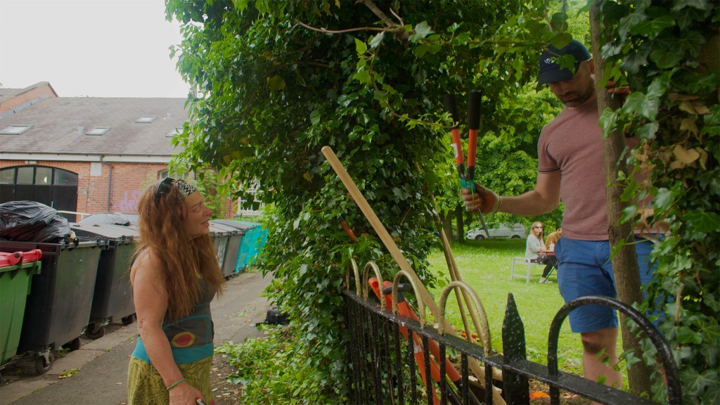 Tim and Beth asking eachother what to plant next.