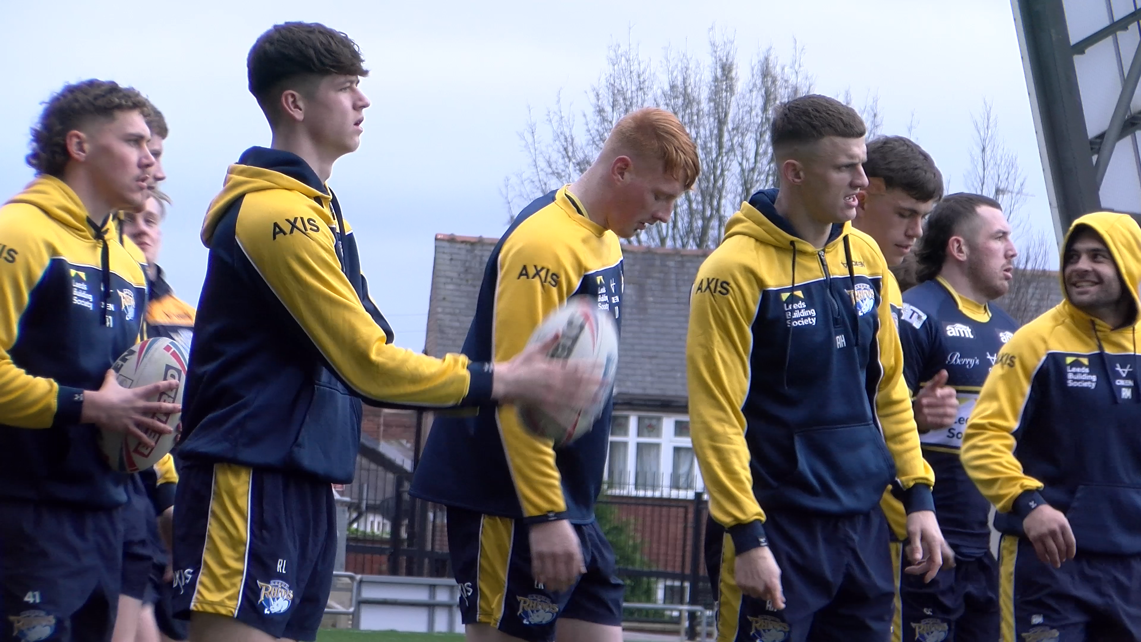 Leeds Rhinos player Luis Roberts in the centre of the frame surrounded by his Rhinos team mates during a training session.