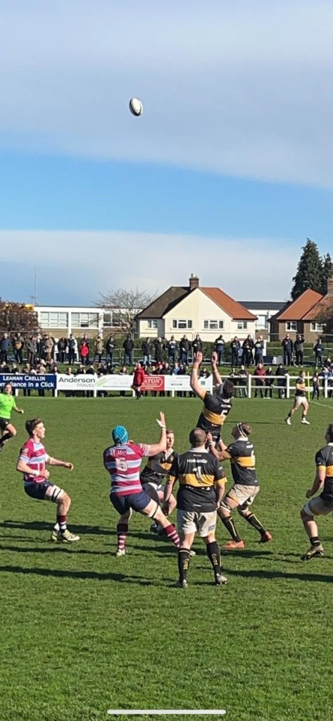 Player lifted into the air to catch the ball