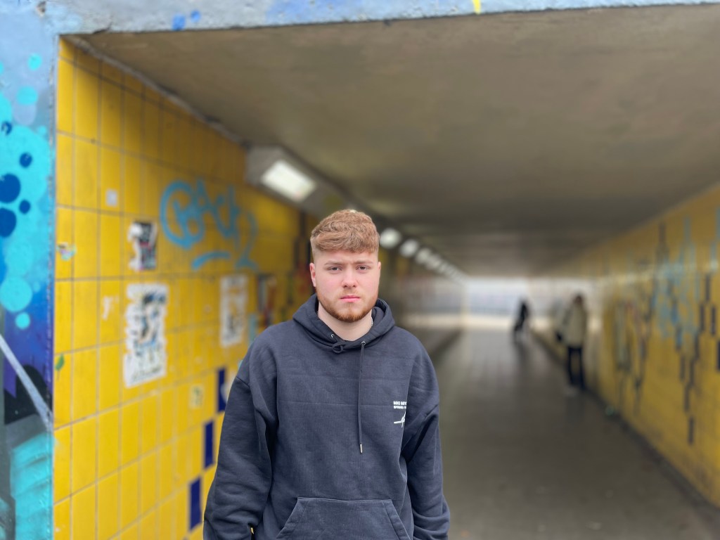 Headshot of Fin with the F stop being the lowest setting